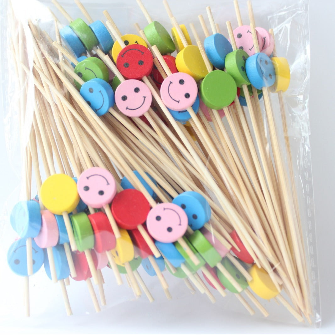 Brochettes en bambou de 12 cm avec de jolis smileys (lot de 100) | Multicolores (une face jaune) | Idéales pour cocktails, amuse-gueules, desserts et hors-d'œuvre | Prix de gros EXW